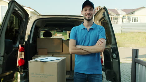 delivery driver in front of van