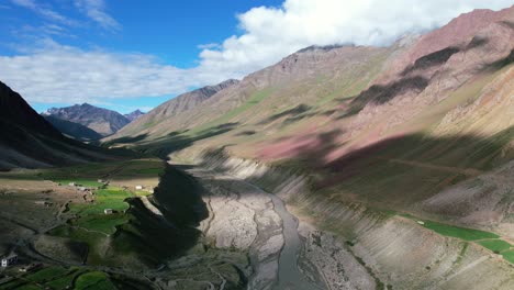 beautiful landscape views of pin valley with purple mountains on a sunny morning in india, aerial