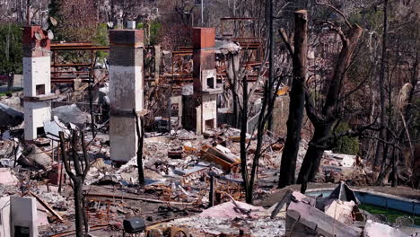 devastating aftermath of a wildfire: residential area in ruins