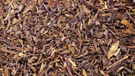 close up of dried black tea leaves