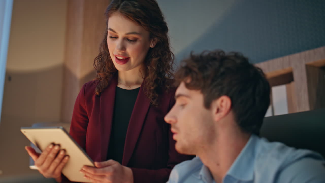 Two colleagues cooperating office work close up. Businessman discussing workflow