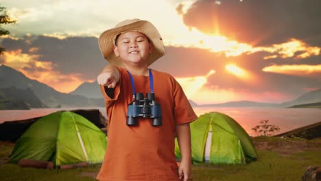 child explorer pointing at sunset