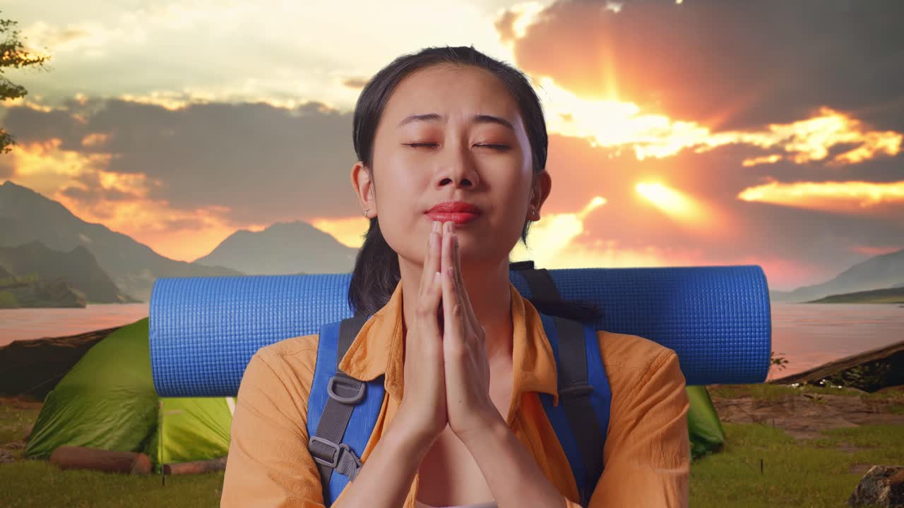Woman Praying for Relief During Camping Trip