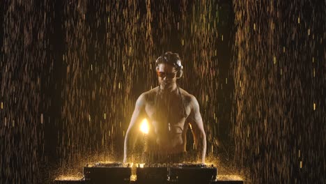 dj performance under a golden rain