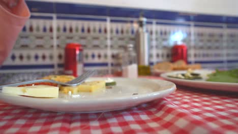 woman eating pizza in italian restaurant