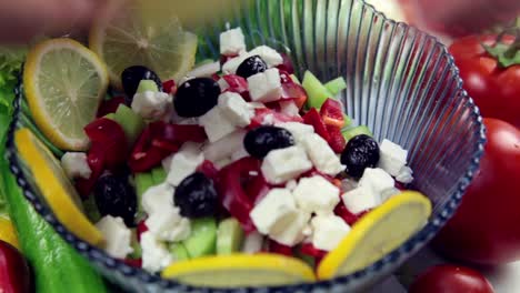 Man-Making-Salad-In-Kitchen-1