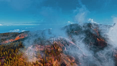 stunning aerial view of gran canaria's rugged landscape shrouded in mist