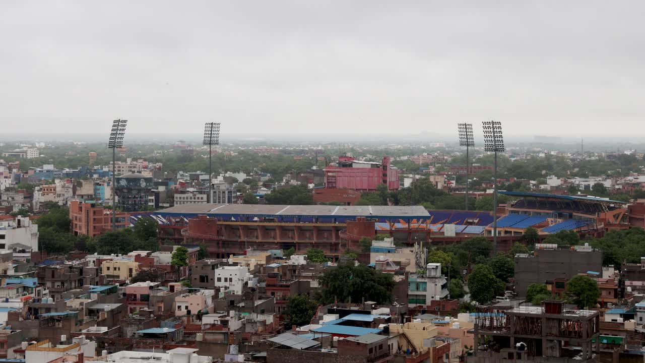 Playing Stadium at City Center with Dense Urban View in Evening image is taken from pachetia hill jodhpur rajasthan india.