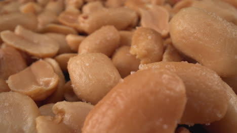 toasted salted peanuts macro, food product used in many commercial producers and recipes like chocolates, sauces and oils, known allergen, healthy nuts, peanut allergy, 4k shot