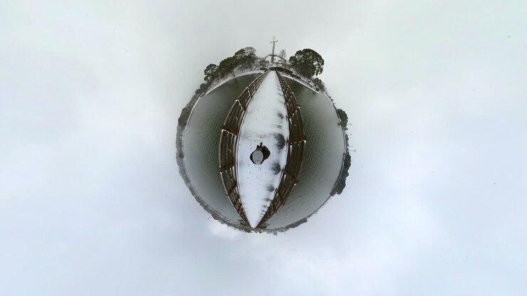 360-degree, little planet of snowing winter park. P.O.V shot.