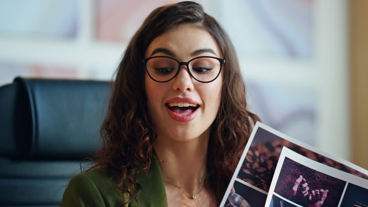 Successful business lady talking to web camera close up. Woman showing design