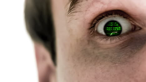 man opening his eye to reveal green scrolling data