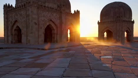 sunrise over ancient tombs in central asia