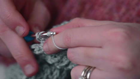 woman hands knitting crochet - close up