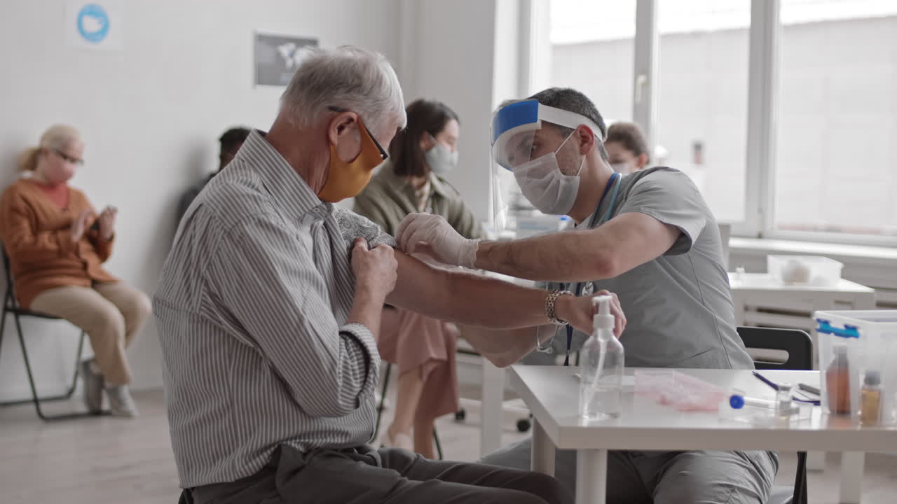 Senior Man Getting Medicine Injection