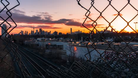 sunset toronto city skyline with trains