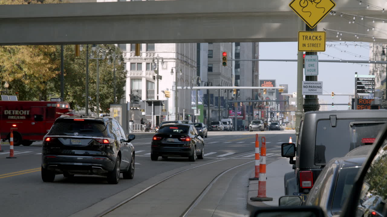 City Street Scene with Traffic and Streetcars in Detroit, Michigan
