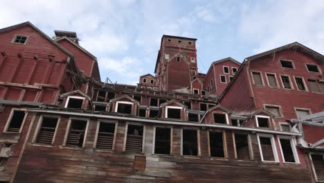 abandoned wooden buildings in old kennicott copper mills settlement, alaska usa