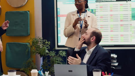 Joyful-supervisor-accidentally-kissing-his-employee-in-excitement