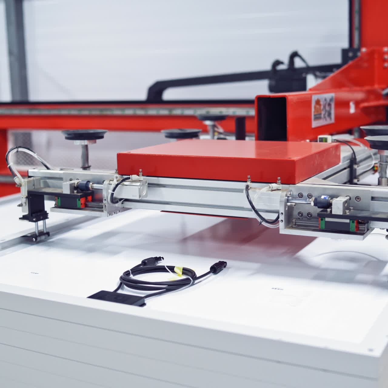 Robotic equipment inside the modern industrial plant. Innovated device at work in factory. Contemporary factory interior.