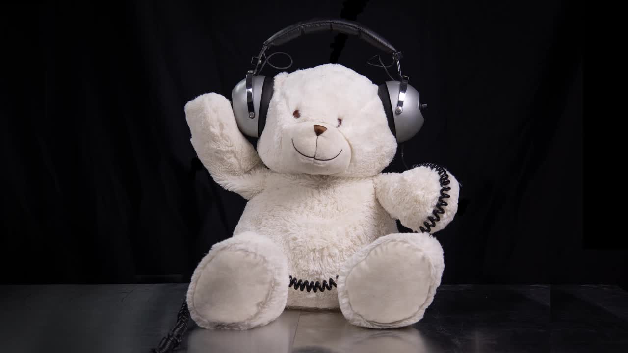 Orsetto di peluche con cuffie