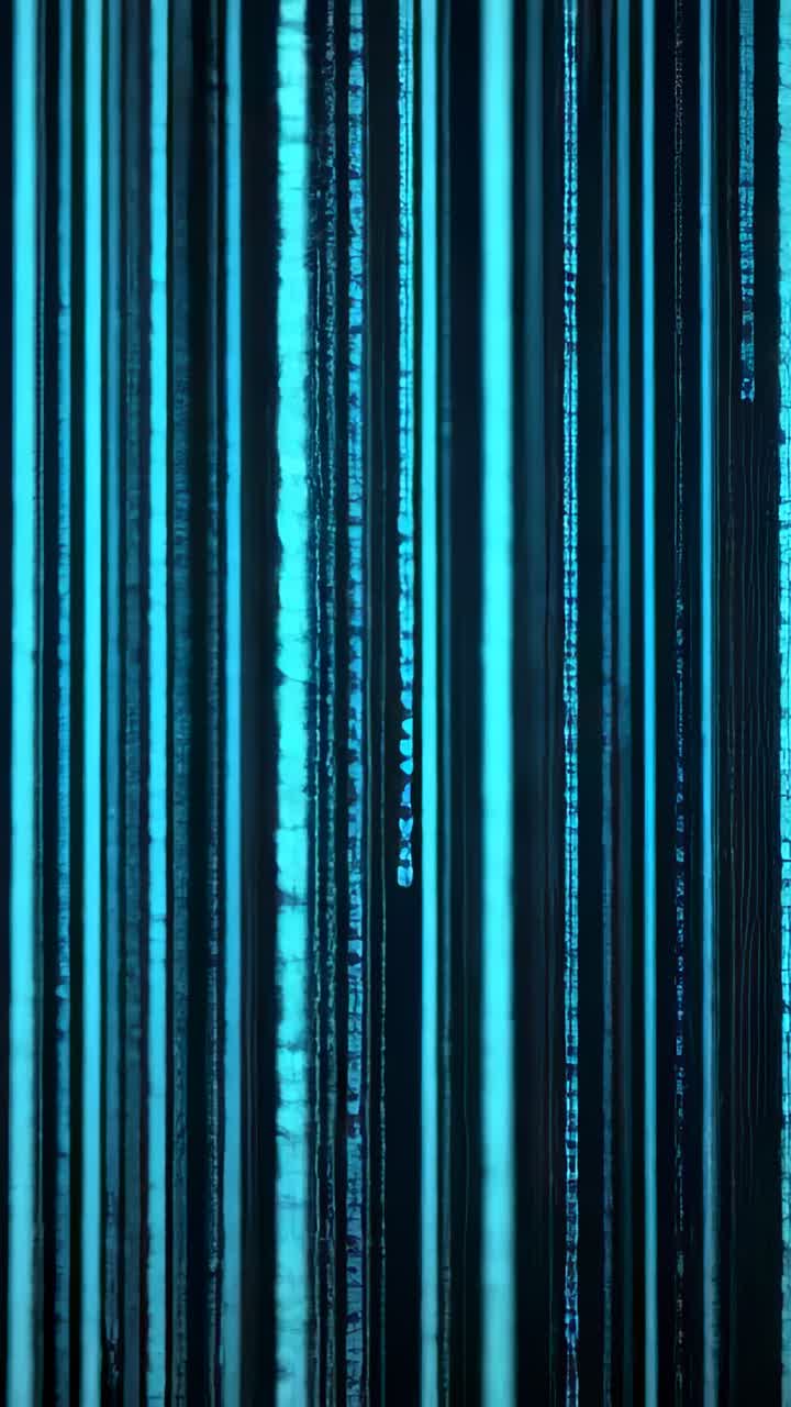 Vertical video: Initiating vertical cyan columns shimmering against navy, forming code-rain effect