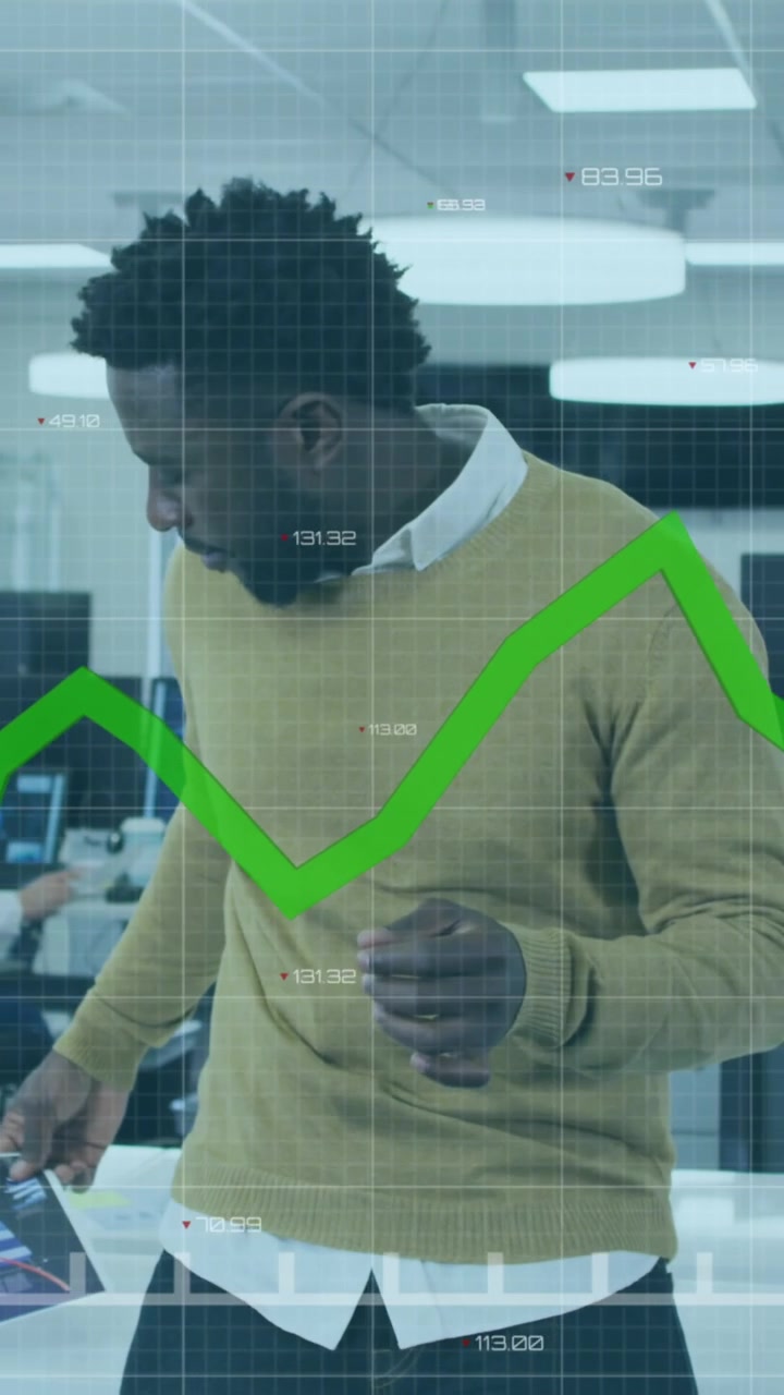Animation of statistics with diverse colleagues working together in an office