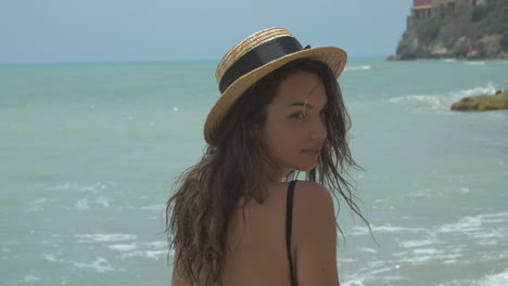 beautiful woman enjoying summer at the beach