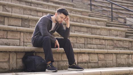 thoughtful man is bored and exhausted.