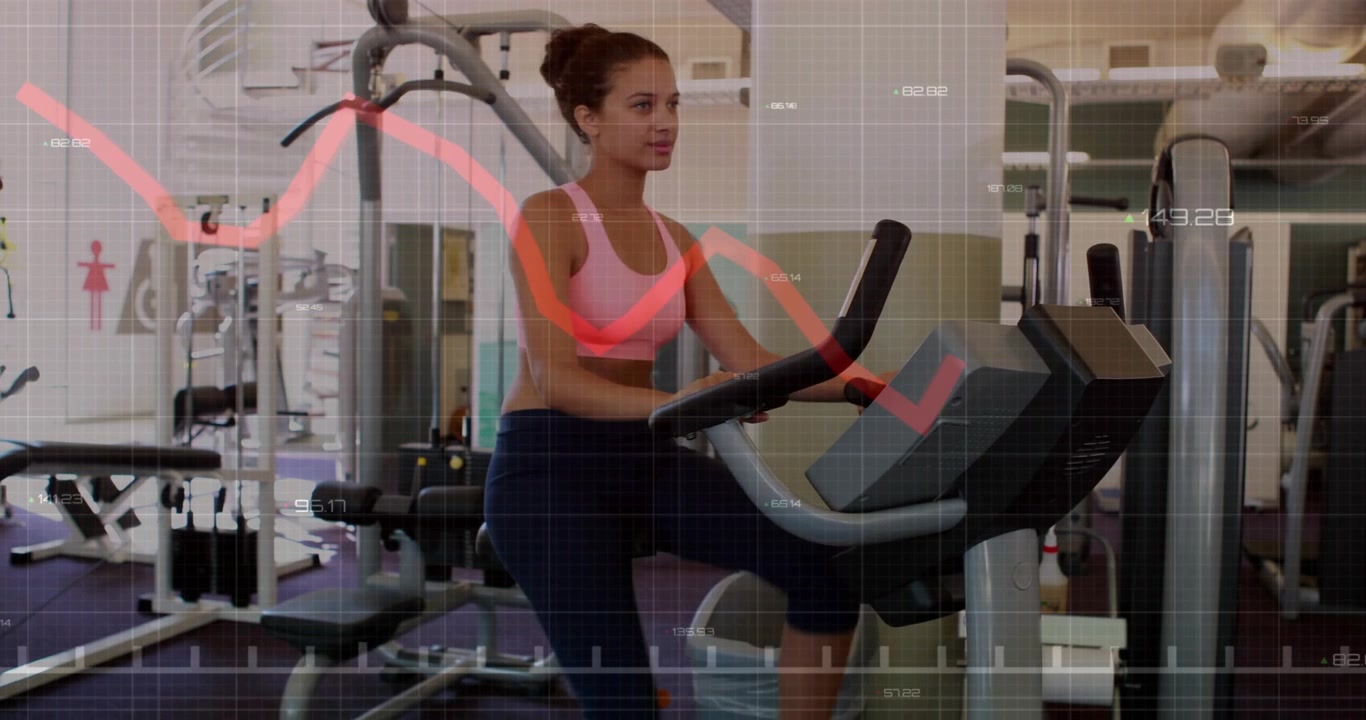 Female fitness enthusiast mounting elliptical trainer in gym, activating grid overlay and red graph
