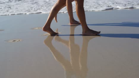 romantic couple walking together at beach 4k