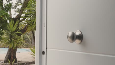 resort hotel white door leading to the garden