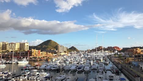 Timelapse-of-boats-in-marina-in-Cabo,-Mexico,-aerial-view