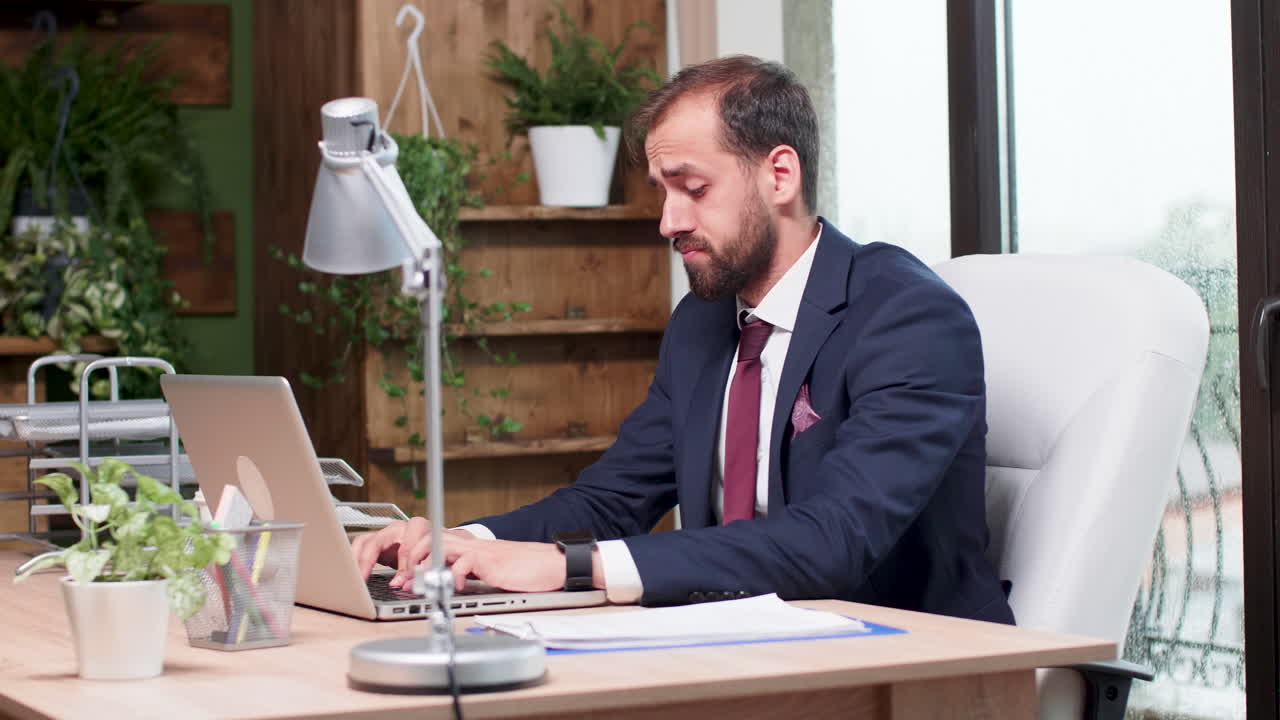 A tired businessman working in the office