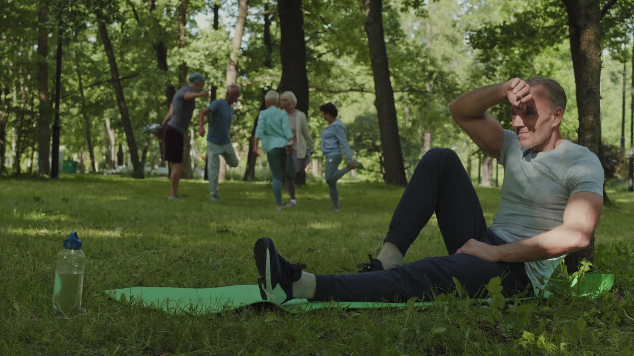 Seniors Exercising in a Park