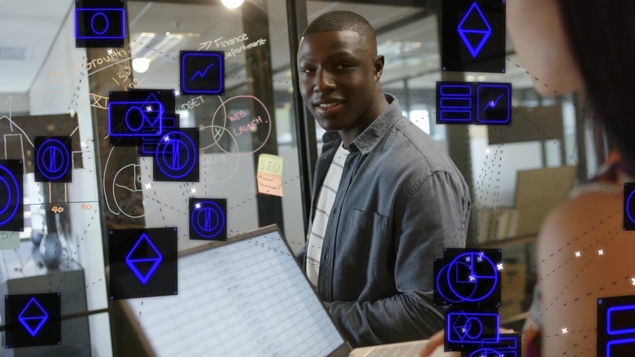 Man tapping marker on glass, woman consulting tablet, blue UI icons animating charts for planning