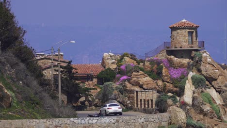 Cars-Driving-Through-Avenida-Borgo-o-Passing-By