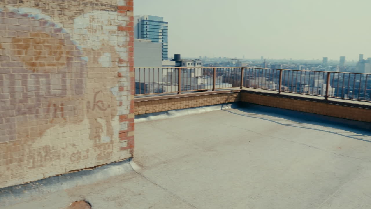 Empty Rooftop with City Skyline View on a Sunny Day