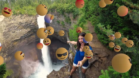 iconos de emoji con una mujer tomando una selfie en el fondo