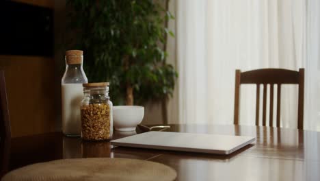 breakfast table with laptop