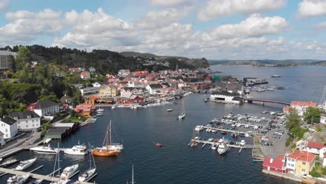 scenic drone shot of kragero town marina, norway - tourism hotspot