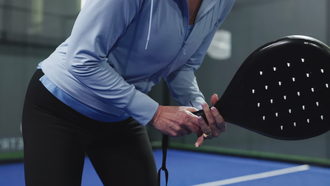 Woman Playing Paddle Tennis