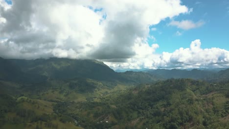 beautiful drone aerial landscape view of green mountains, sunny day in guatemala