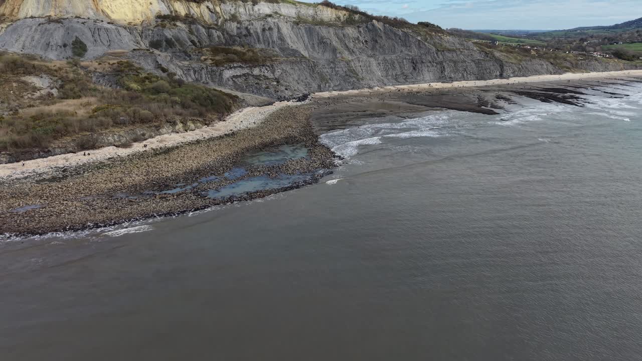 Lyme Regis UK The Spittles cliffs and beach Jurassic Coastline drone aerial view