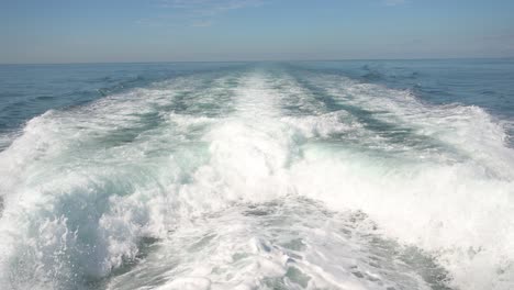 wake from twin outboard motors on the banderas bay in puerto vallarta mexico, handheld