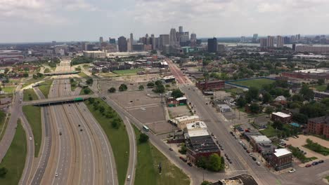 detroit skyline over highway by drone 4k