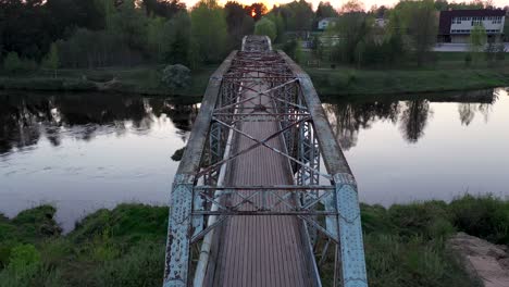 Historical-bridge-of-Valmiera-over-river-Gauja-in-aerial-drone-view