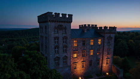 illuminated castle at twilight