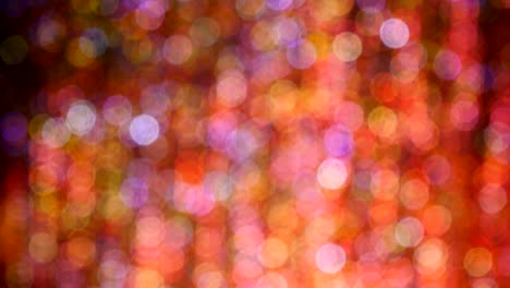 un bucle de video de 4k de fondo bokeh abstractamente colorido desde la luz.