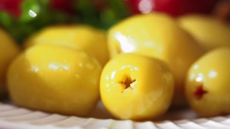 close-up of yellow pickled olives